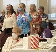 Sea Belles singing for Janet