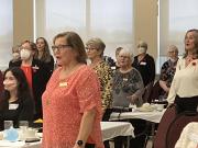 Sea Belles and former members singing for Janet